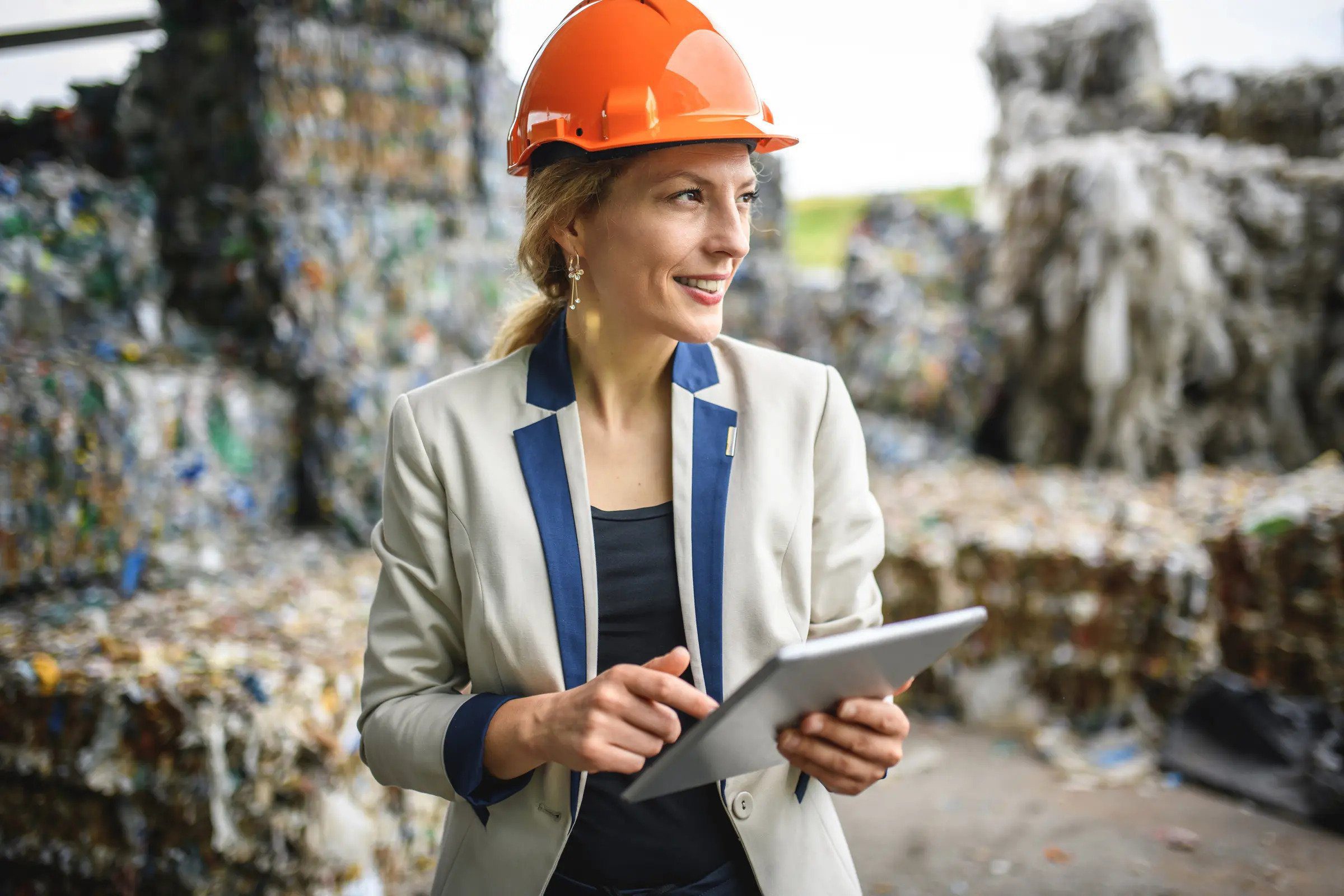 Technician monitoring an advanced plastic recycling machine