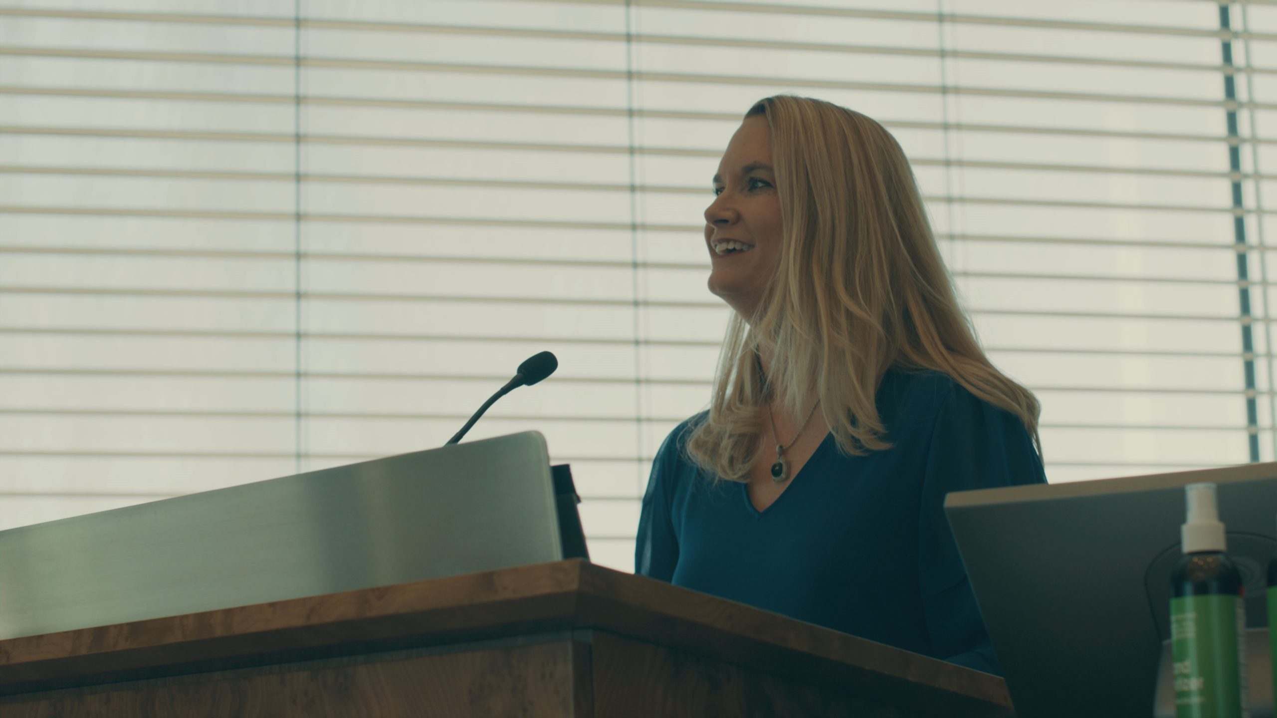 Woman at podium