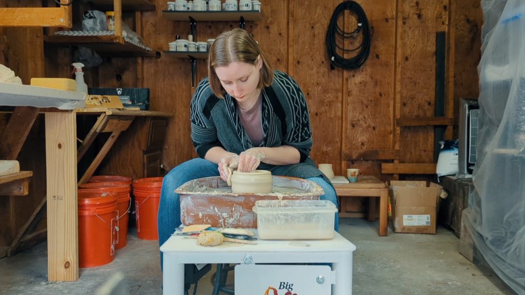 Jeanne working with clay