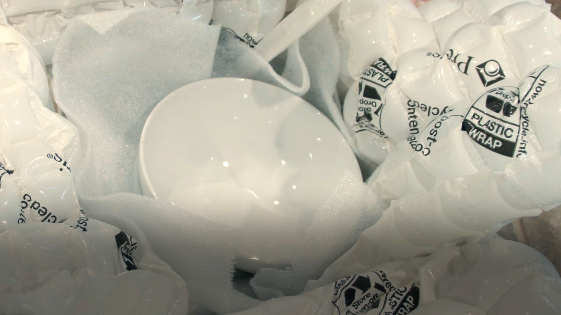 Plastic packaging material