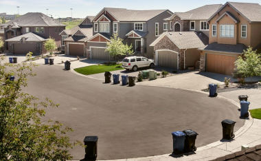 Garbage containers on the street in Residential District