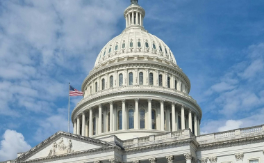 The United States Capitol building, indicating a policy discussion on energy efficiency costs